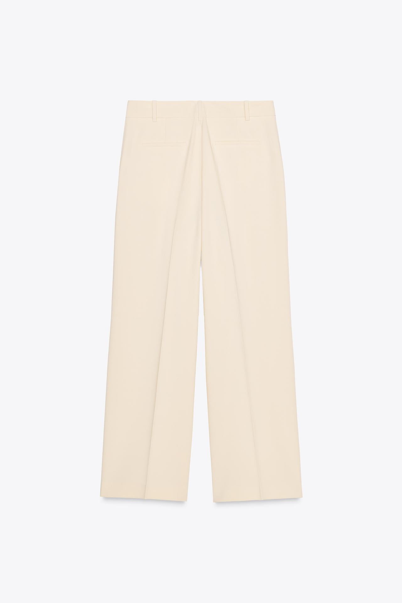 CALÇA LARGA COM PREGAS