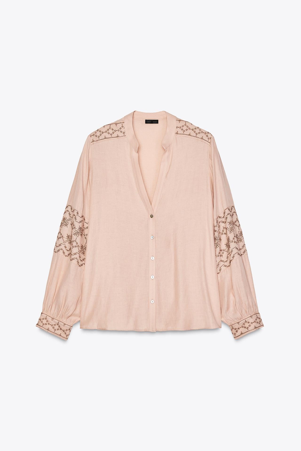 BLUSA COM BORDADOS