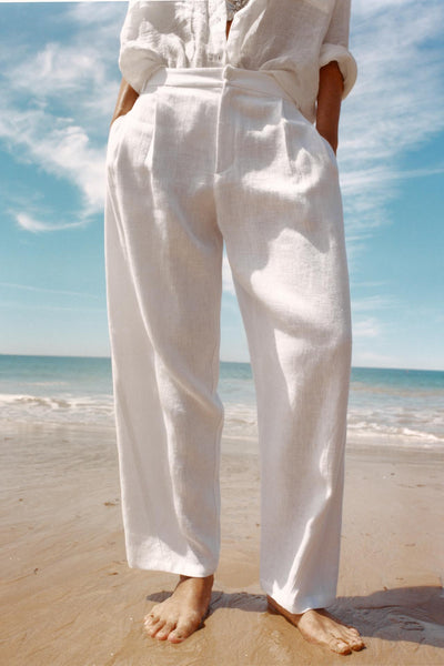 CALÇA COM PREGAS DE LINHO 100%