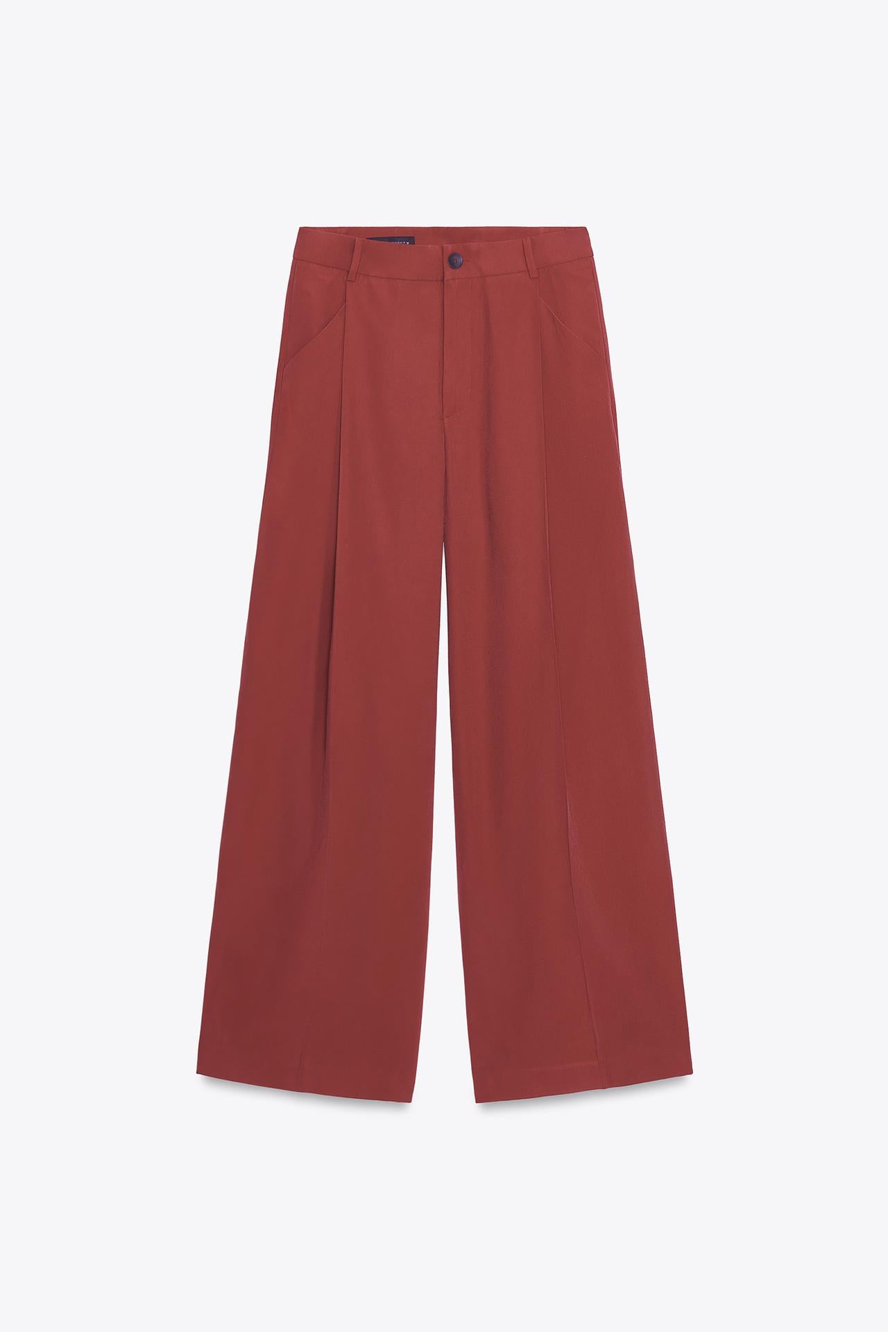 CALÇA COM PREGA