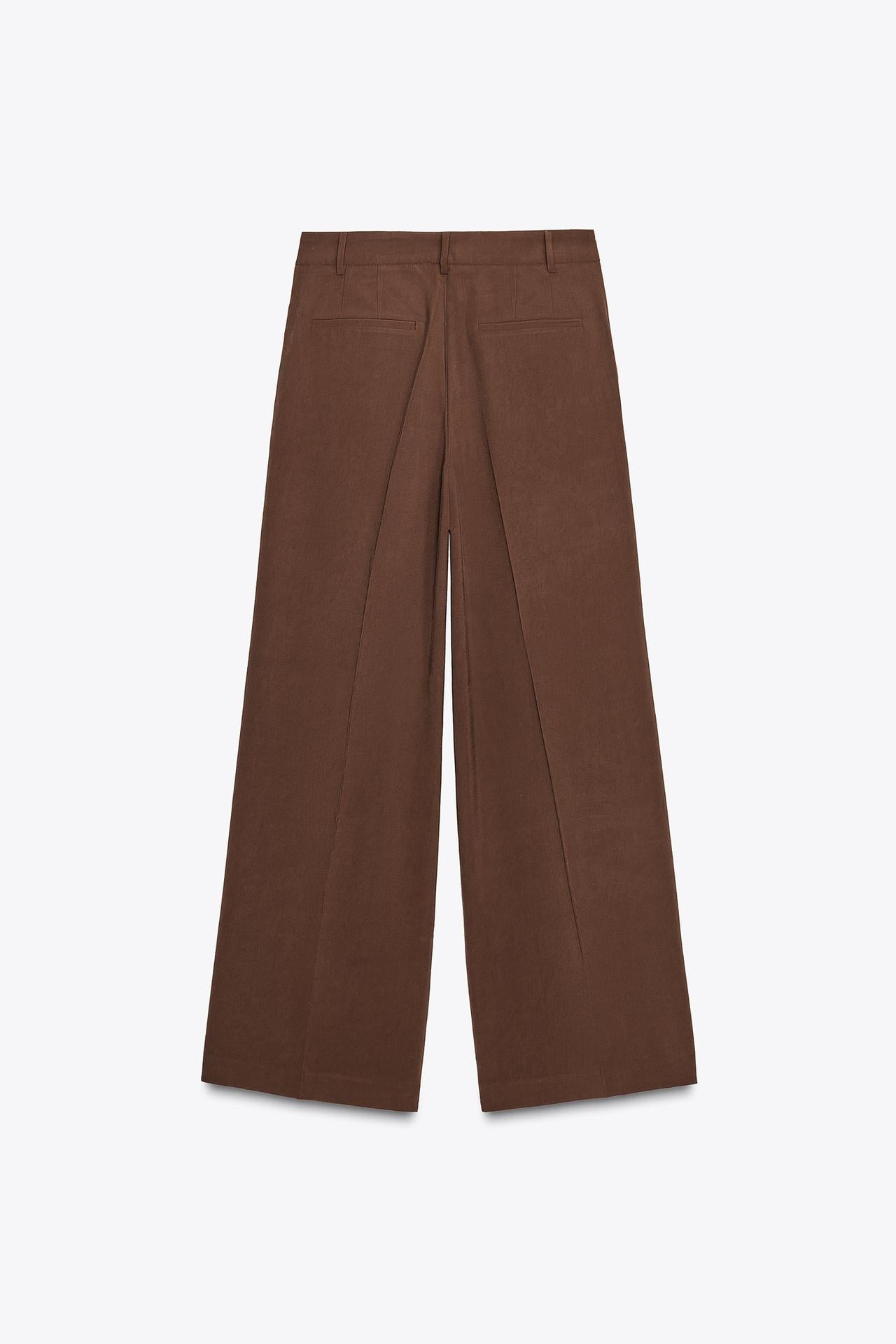 CALÇA COM PREGA CATANHO ESCURO