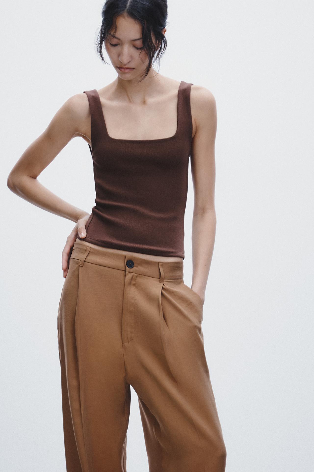 CALÇA COM PREGA