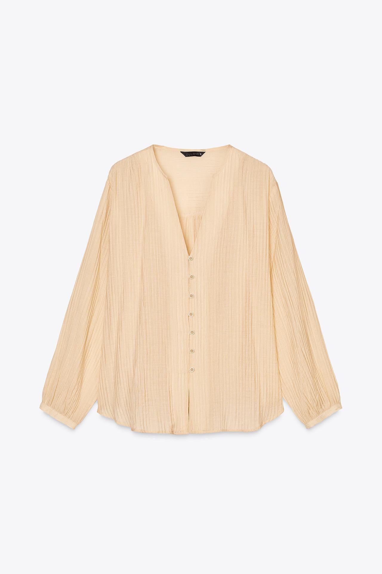 CAMISA COM ESTRUTURA E BOTÕES